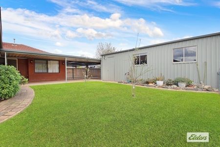 Charming 3-Bedroom Home with Outdoor Extras & Workshop! - Photo 4