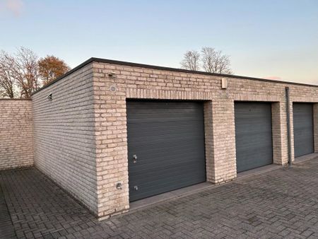 Ruim gelijkvloers appartement met tuin en garagebox - Foto 2