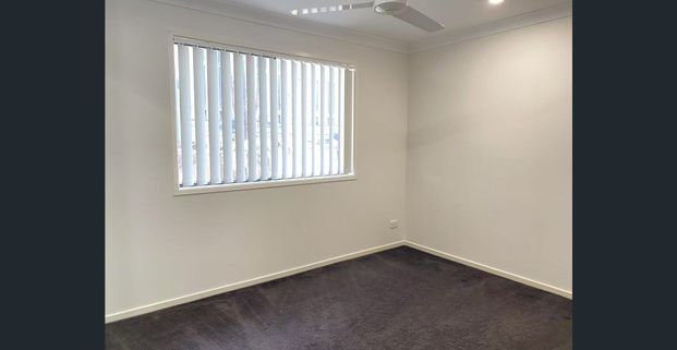 Modern 4-Bedroom Family Home in the Heart of Pimpama - Photo 1