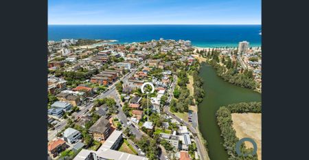 Dual Level Family Home With Lagoon Views - Photo 2
