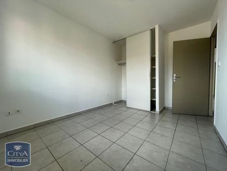 Location Appartement 3 pièces 68m² ST DENIS 97400 - Photo 2