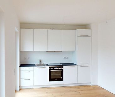 Erstbezug: Kompakte 3-Zimmer-Wohnung mit hochwertiger Einbauküche - Photo 4