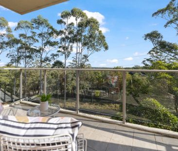 Light Filled Apartment with Oversized Lockup Garage - Photo 3