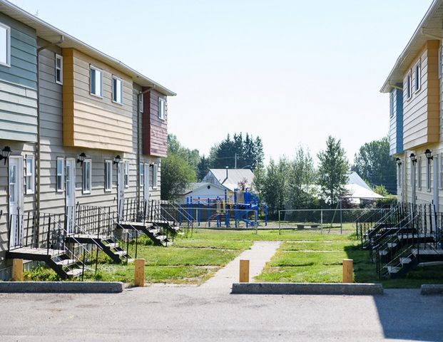 Klondike Townhouses | 5422 Airport Drive, Fort Nelson - Photo 1