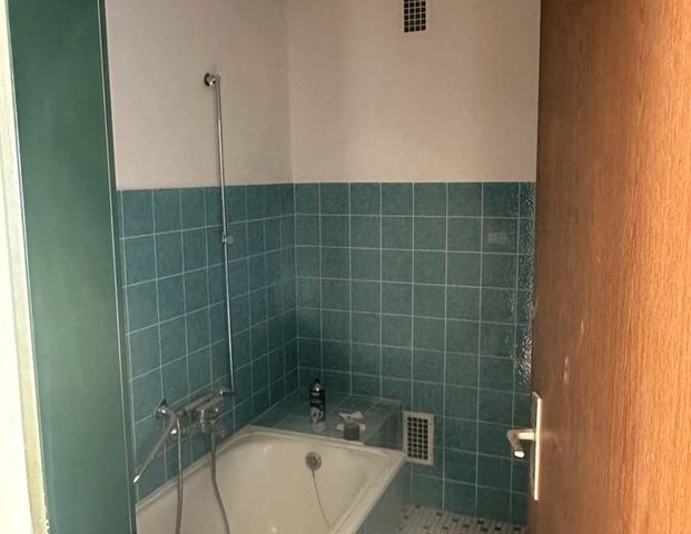 Charmante 3 ZKB Dachgeschosswohnung in zentraler Lage - Foto 1