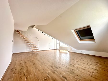 Ansprechende Maisonette-Wohnung mit Einbauküche und Loggia in zentraler Wohnlage - Photo 2