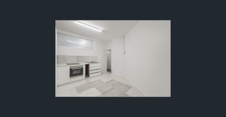 Style Split-Level 1 Bedroom Unit (Utilities Included!) - Photo 3