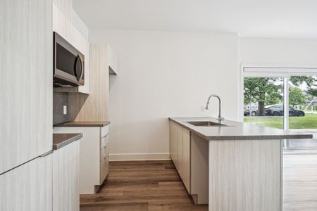 Appartement à louer - Laval (Chomedey) (Place Renaud) - Photo 3