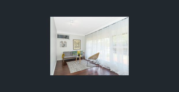 Delightful 4-Bedroom + Sunroom Home - Photo 1