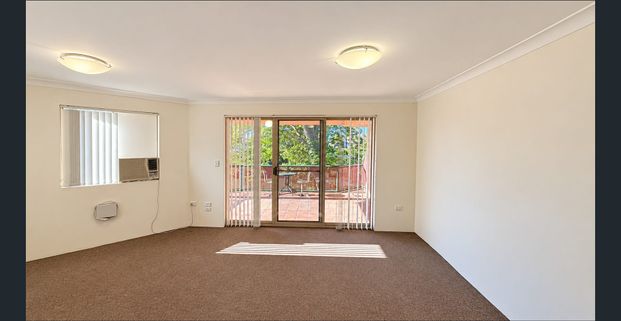 TWO BEDROOM UNIT WITH RIVERSIDE VIEWS ! - Photo 1