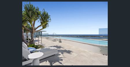 Modern Waterfront Apartment with Panoramic Broadwater Views! - Photo 2