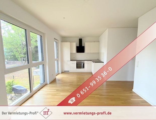 Luxuriös wohnen direkt an der Mosel - Lichtdurchflutete und barrierefreie 2ZKB Wohnung mit Balkon, Einbauküche, Fußbodenheizung und Tiefgaragenstellplatz! - Foto 1