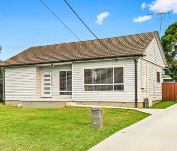 Charming 3-Bedroom Home with Modern Amenities and Ample Outdoor Space - Photo 2