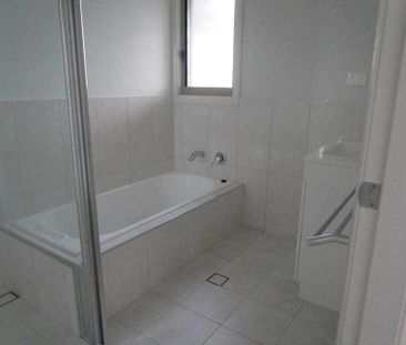 Stylish Four-Bedroom Home with Contemporary Features - Photo 5