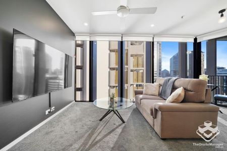 Fully Renovated One-Bedroom Apartment | Modern Interiors | Secure Carpark | Spire Residences - Photo 2