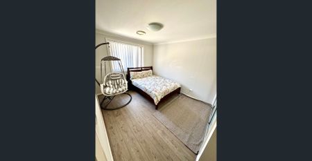 FOR RENT – Spacious Modern Family Home with Full Backyard Deck - Photo 5