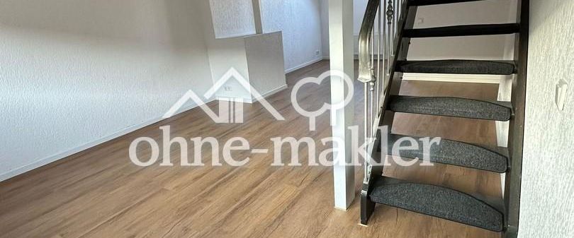 Frisch sanierte Dachgeschosswohnung mit neuer Einbauküche - Foto 1