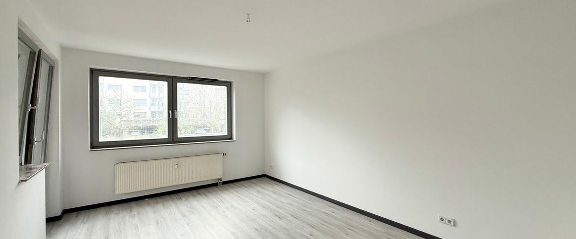 Schöne 3-Zimmer-Erdgeschosswohnung mit Balkon in zentrumsnaher Lage - Photo 1