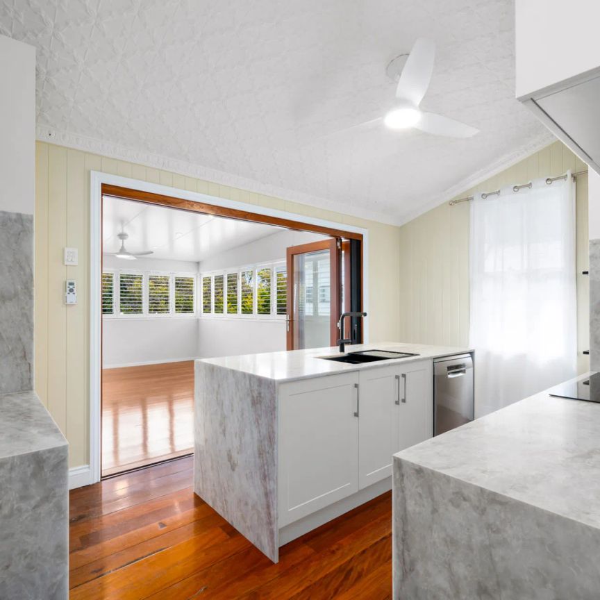 STUNNING RENOVATED QUEENSLANDER OFFERING LUXURY INNER-CITY FAMILY LIVING - Photo 1