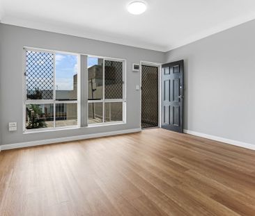 Coastal Convenience - Quiet Top-Floor Living - Photo 2