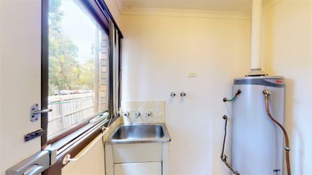 Cozy 2-Bedroom Unit - Photo 2