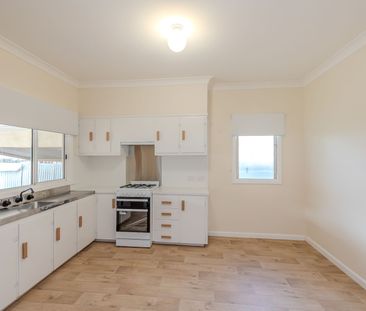 Spacious & Freshly Updated Family Home Close to Town - Photo 6