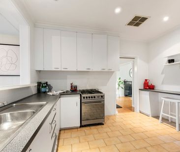 Charming Family Home with Multiple Living Areas - Photo 6