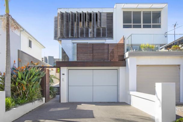 STUNNING COASTAL ARCHITECTURAL ABODE FLOODED IN NATURAL LIGHT - Photo 1