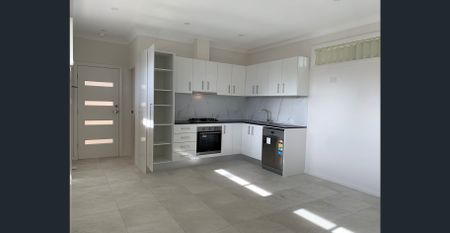 NEAR NEW home in a perfect location with North-facing master bedroom, lounge and private backyard. - Photo 3