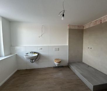 / Mitten im Leben: Stilvolle Stadtwohnung mit Balkon und Stellplatz... - Photo 4