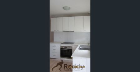 READY TO MOVE INTO - Photo 2