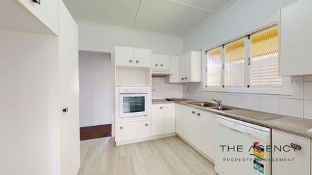 High-set family home in central location - Photo 3