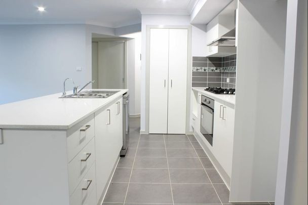 Modern Four Bedroom Family Home In A Sought After Neighbourhood - Photo 1