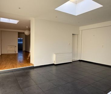 Verzorgd gelijkvloers 1-slpk appartement met tuin - Photo 3