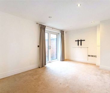 A striking two bedroom detached city home in a thriving central loc... - Photo 1