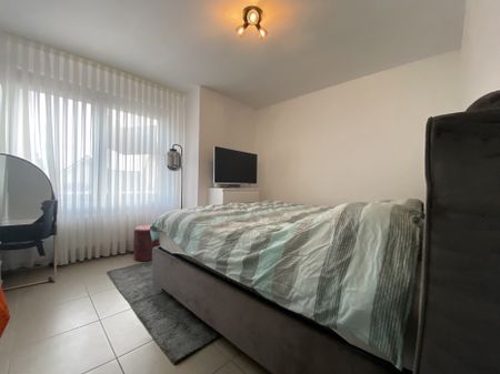 Ruim appartement in het centrum van Baarle-Hertog met dakterras van 23 m²! - Photo 2