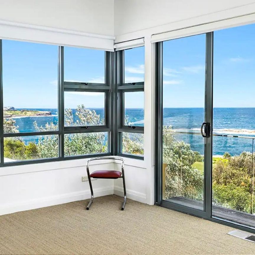 Furnished Coastal Oasis with Panoramic Views and Artistic Flair - Photo 1