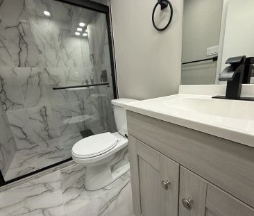 Beautifully Renovated 2 Bed Basement | Utilities Included | Pet Fri... - Photo 1