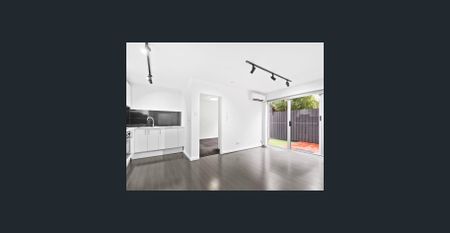 SENTATIONAL 1 BEDROOM APARTMENT WITH PRIVATE COURTYARD AND OFF-STREET PARKING! - Photo 2