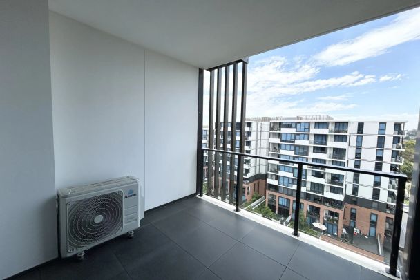 Convenient and Modern Living in a Prime Location - Photo 1