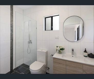 Modern 4-Bedroom Family Living with Space, Style & Convenience - Photo 5