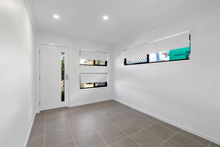 “Stunning 4-Bedroom Family Home in Ripley” - Photo 4