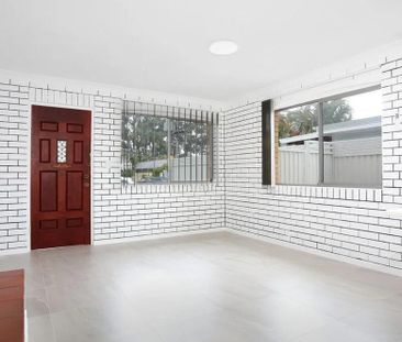 Charming Family Home in Coombabah - Photo 5