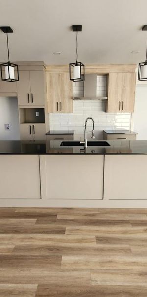 5 1/2 dans Triplex secteur Deauville - Photo 1