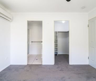 WELCOME TO 25 BAUHINIA STREET - WHERE COASTAL COMFORT MEETS EVERYDA... - Photo 1