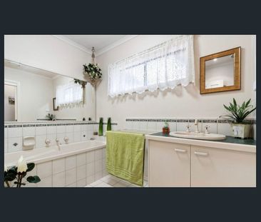 Light-Filled 3 Bedroom Home with Classic Charm and Outdoor Living - Photo 2