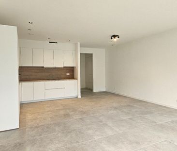 Nieuwbouwwoning met 3 slaapkamers en tuin in het centrum van Mol! - Photo 1