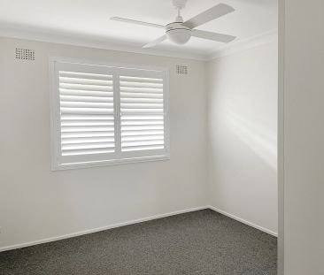 Beautifully Renovated 3-Bedroom Home - Photo 6
