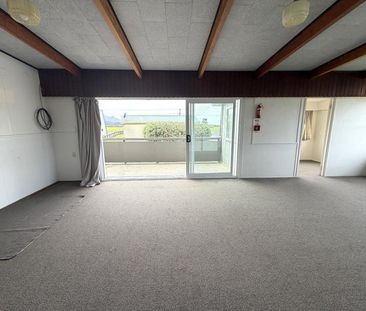 Beach Views on Bruce - Upstairs Flat - Photo 1