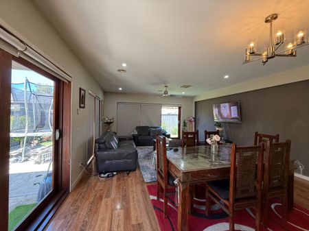 Spacious 4-Bedroom Home with Two Living Areas and Modern Upgrades - Photo 2